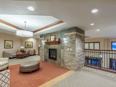 Cozy common area with seating and fireplace