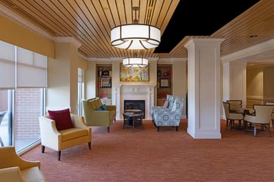 Bright common area with seating and artwork