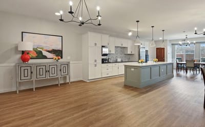 Bright interior view of a kitchen and dining area