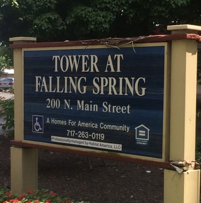 Exterior sign for Tower At Falling Spring facility