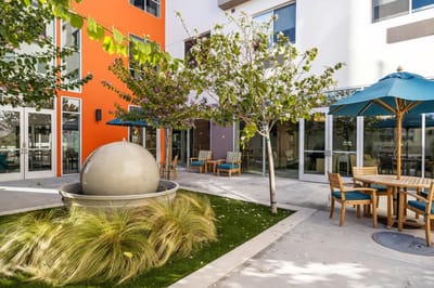 Outdoor space with seating and decorative features