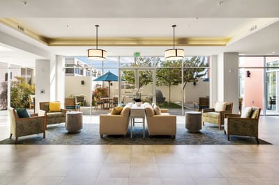 Common area with seating and views of the garden