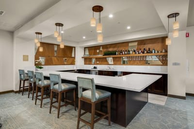 A stylish bar area in a senior living facility