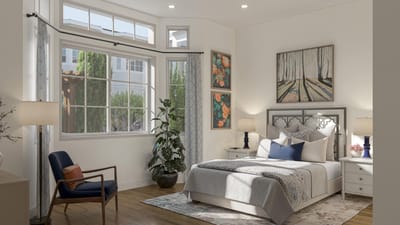 Brightly lit resident room with bed and decor
