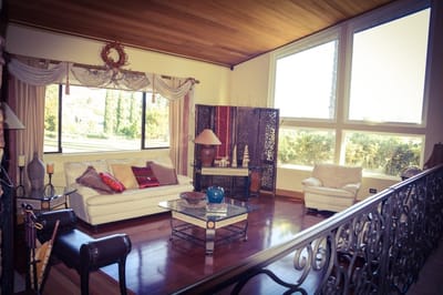 Cozy common area with modern furnishings and large windows