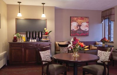 Cozy common area with coffee station and seating