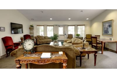 Bright common area with comfortable seating and decor