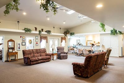Interior common area with seating and residents