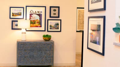 Bright interior hallway with art and decor