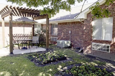 Outdoor seating area with garden and gazebo