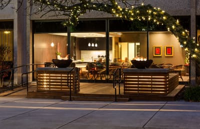 Outdoor patio with fire features and lights