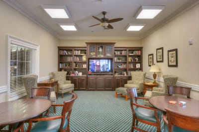 Interior common area with seating and bookshelves