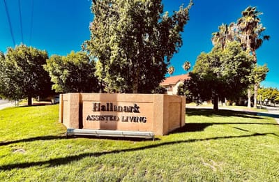 Exterior view of Hallmark Assisted Living entrance sign