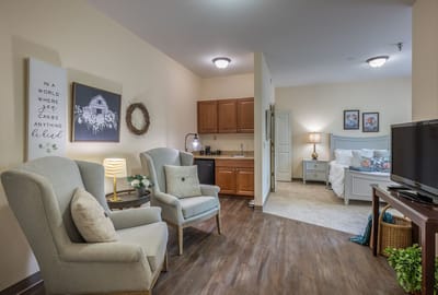 Cozy interior of a resident's room with furniture