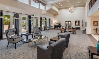 Interior lounge area with seating and piano