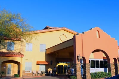 Exterior view of Pennington Gardens facility with entrance