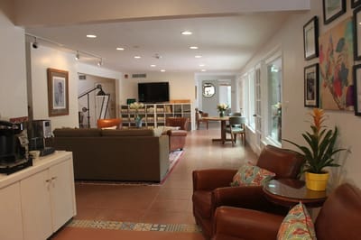 Bright interior common area with seating and decor