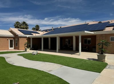 Outdoor view of a senior living facility with solar panels