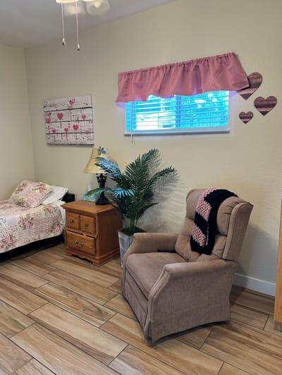Cozy resident room with a chair and decorative elements