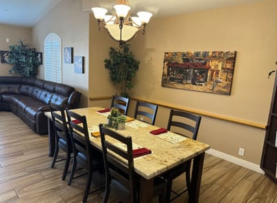 Dining area with a large table and seating
