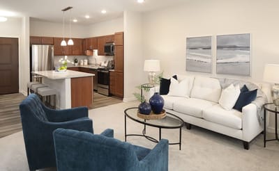 Modern interior living space with kitchen and seating area