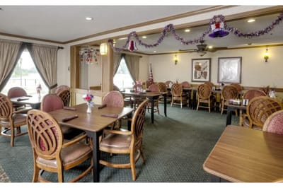 Dining room with decorated tables and chairs
