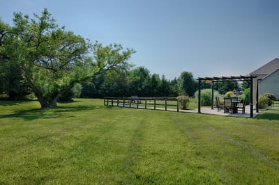 Outdoor space with seating arrangements and greenery