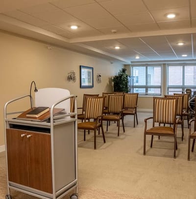 A common area with chairs arranged for an event
