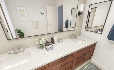 A bright bathroom with modern fixtures and decor
