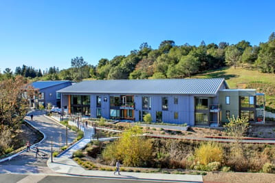 Exterior view of Enso Village with landscaped surroundings