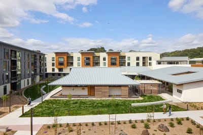 Aerial view of a senior living facility with outdoor spaces