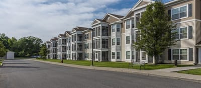 Exterior view of the building with landscaped grounds