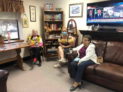Residents enjoying time in a cozy common area