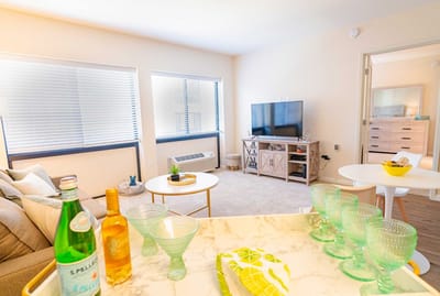 Bright interior of a resident's room with seating area
