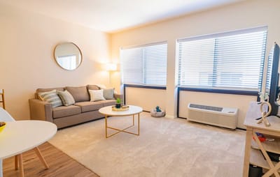 Bright common area with seating and decor