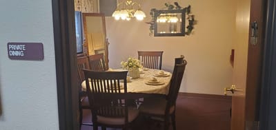 Private dining room with a table set for dining