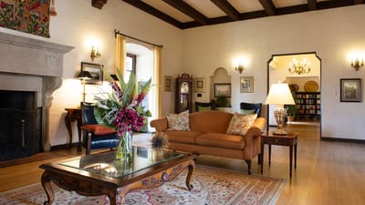 Cozy common area with seating and floral decor