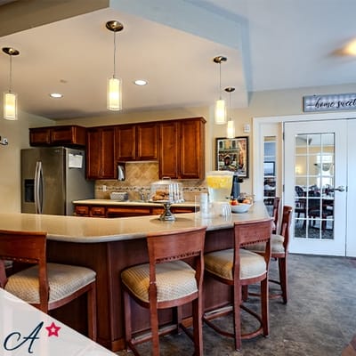Well-lit interior of a common area kitchen