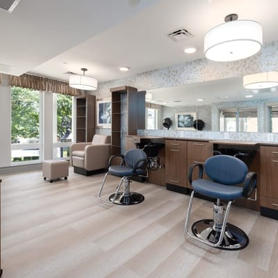 A modern hair salon area in an assisted living facility