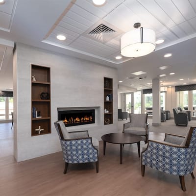 A well-lit common area with comfortable seating
