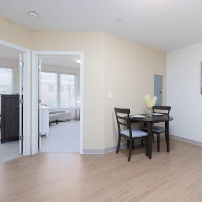 Interior view of a resident room with a dining table