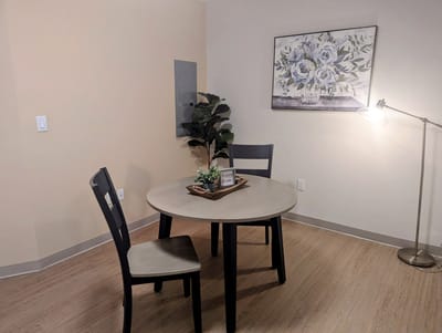 Cozy dining area with a simple table and chairs