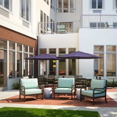 Outdoor seating area with umbrellas and chairs