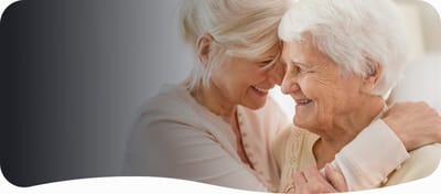 Caring interaction between a staff member and an elder resident