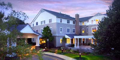 Exterior view of Maplewood at Orange during twilight
