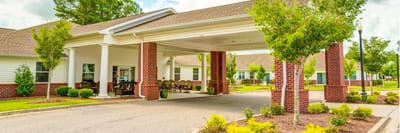 Entrance of Spring Oak at Christiansburg with outdoor seating