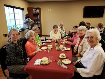 Residents enjoying tea in a dining area