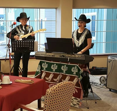 Musicians performing in a common area during an event