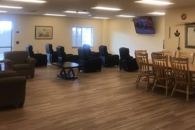 Interior common area with seating and dining tables