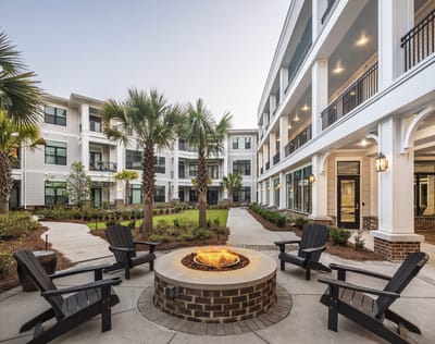 Outdoor courtyard with fire pit and seating area
